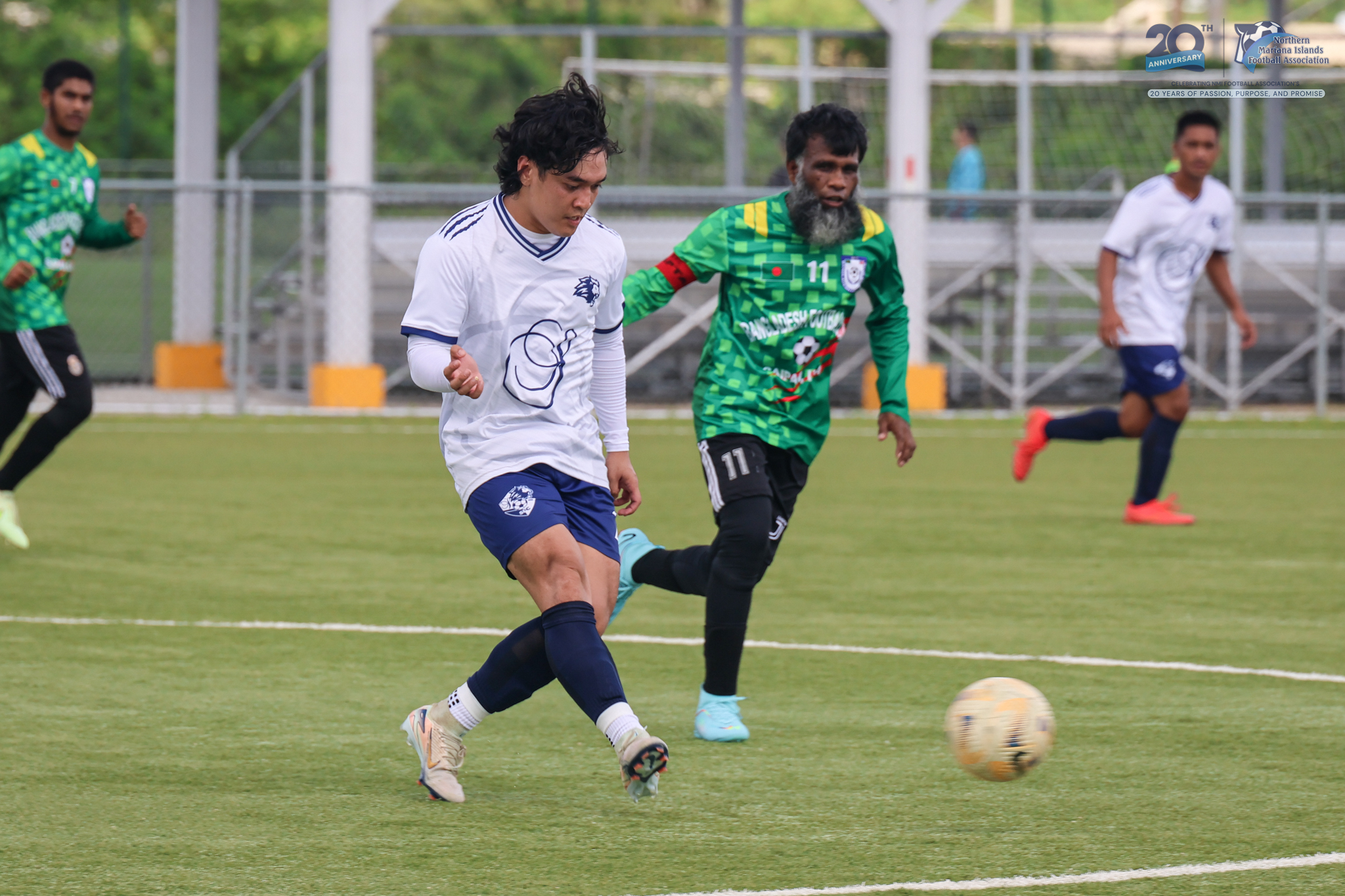 May be an image of 5 people, people playing soccer, people playing football and text