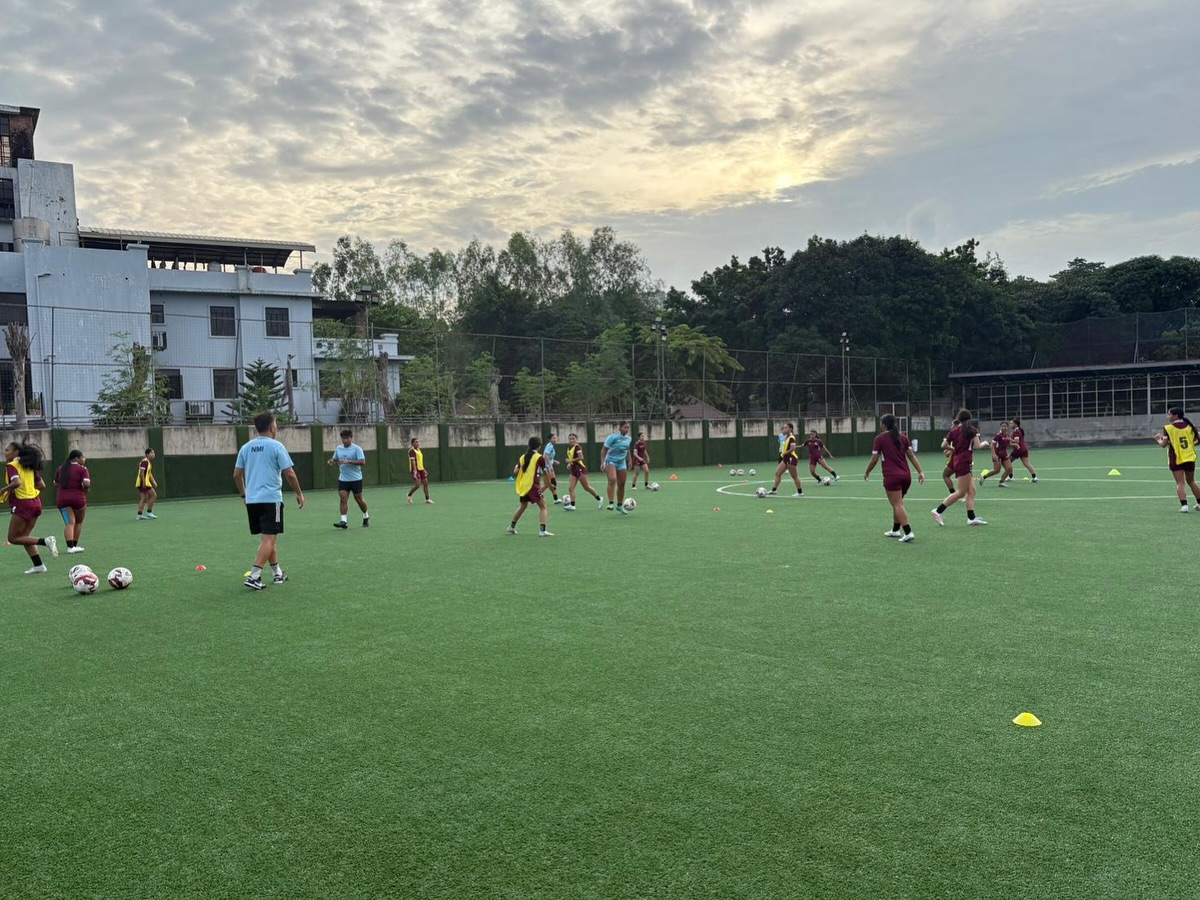 May be an image of 14 people, people playing football, people playing soccer, grass and text