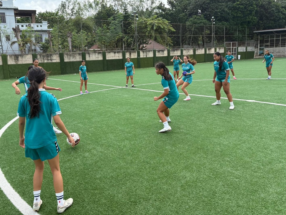 May be an image of 8 people, people playing football and people playing soccer