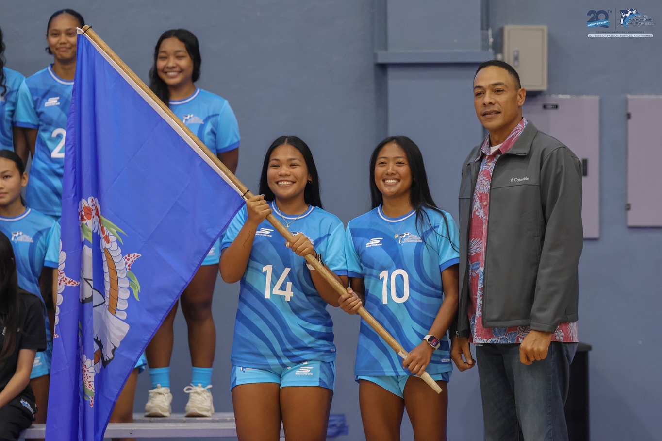 May be an image of 8 people, people playing voleyball and text