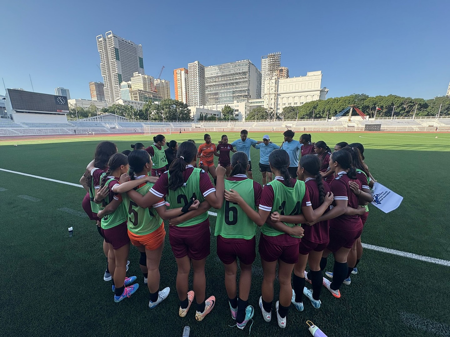 May be an image of 4 people, people playing soccer, people playing football and text