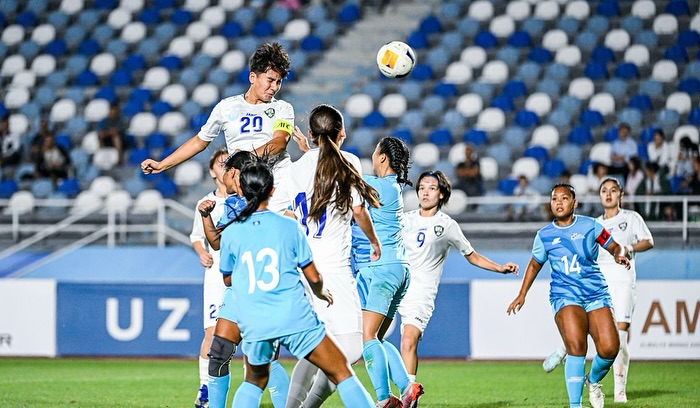 May be an image of 4 people, people playing football, people playing soccer and text