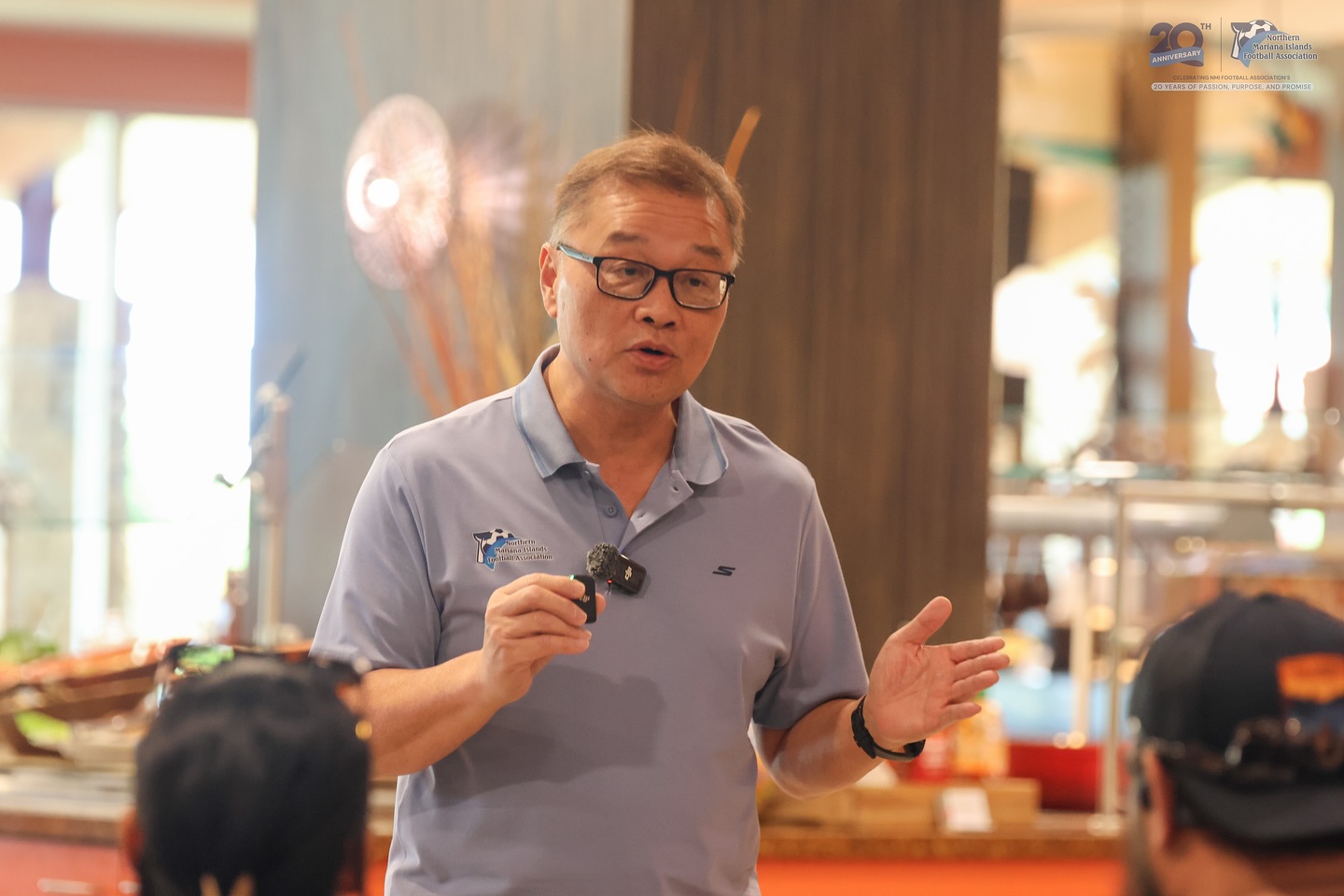 May be an image of 3 people and text