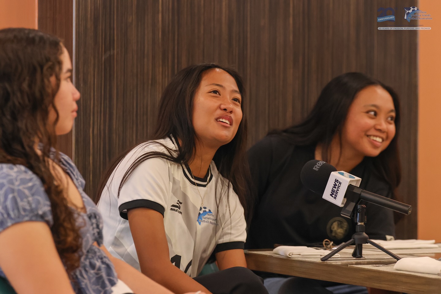 May be an image of 3 people and text