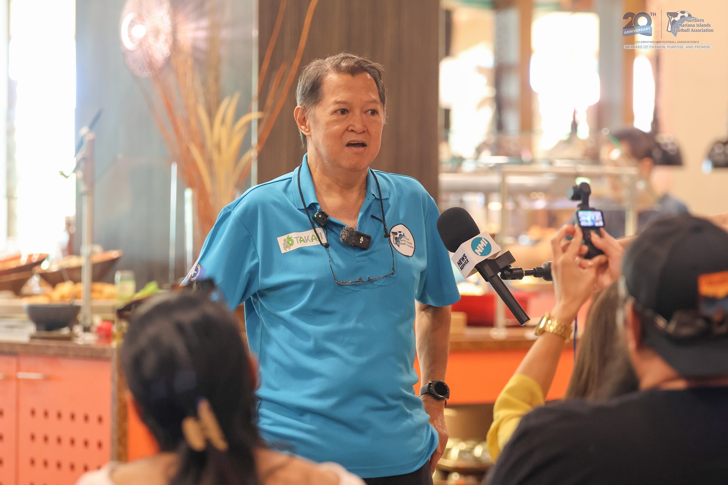 May be an image of 3 people and text