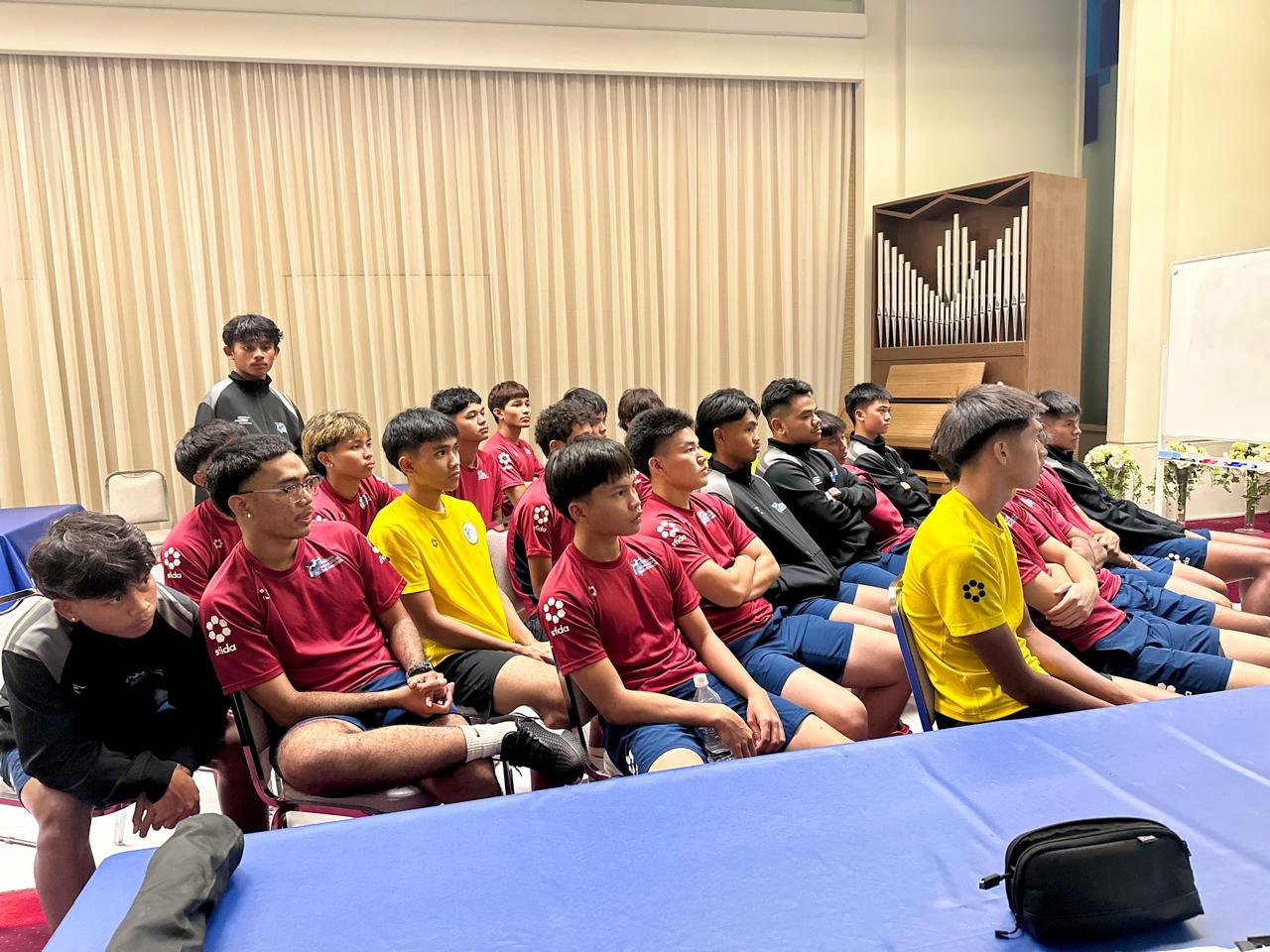 May be an image of 5 people, people studying and text