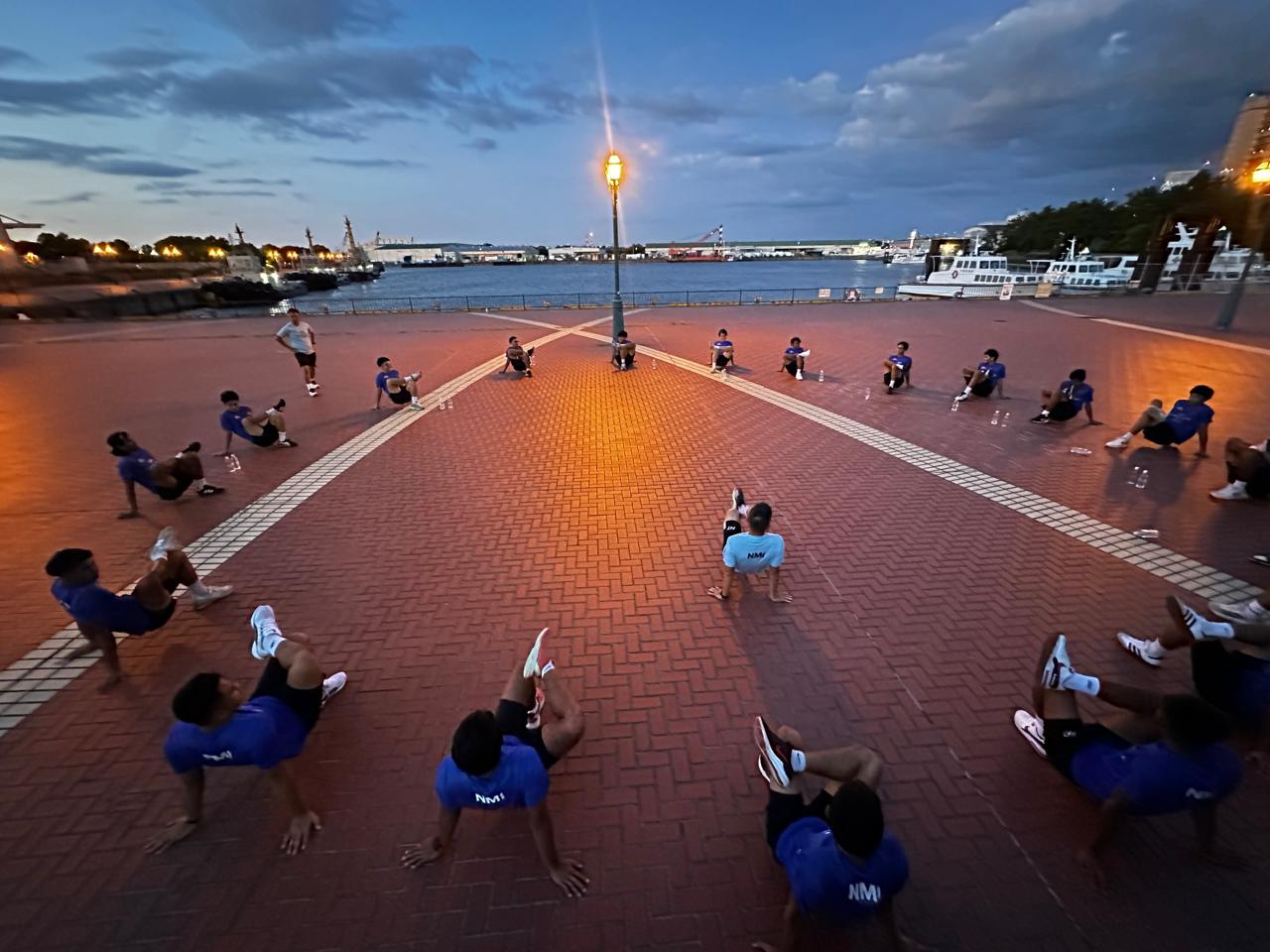 May be an image of 8 people and people practicing yoga