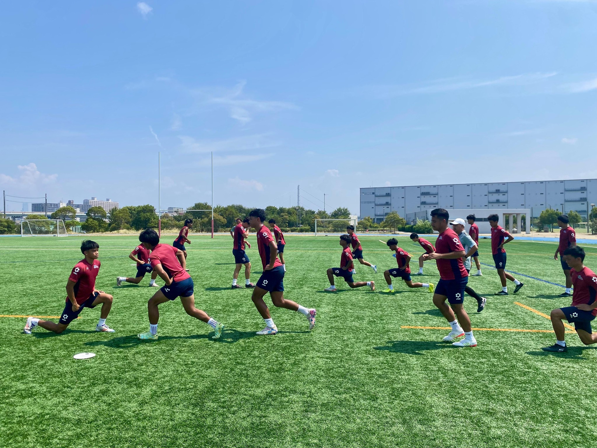 May be an image of 13 people, people playing football and people playing soccer
