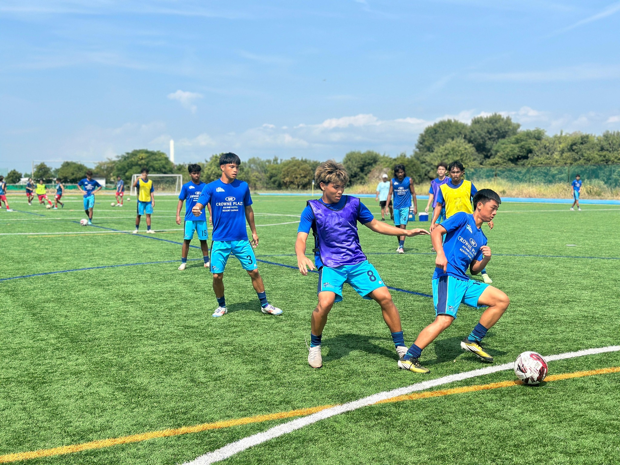 May be an image of 11 people, people playing football, people playing soccer, grass and text