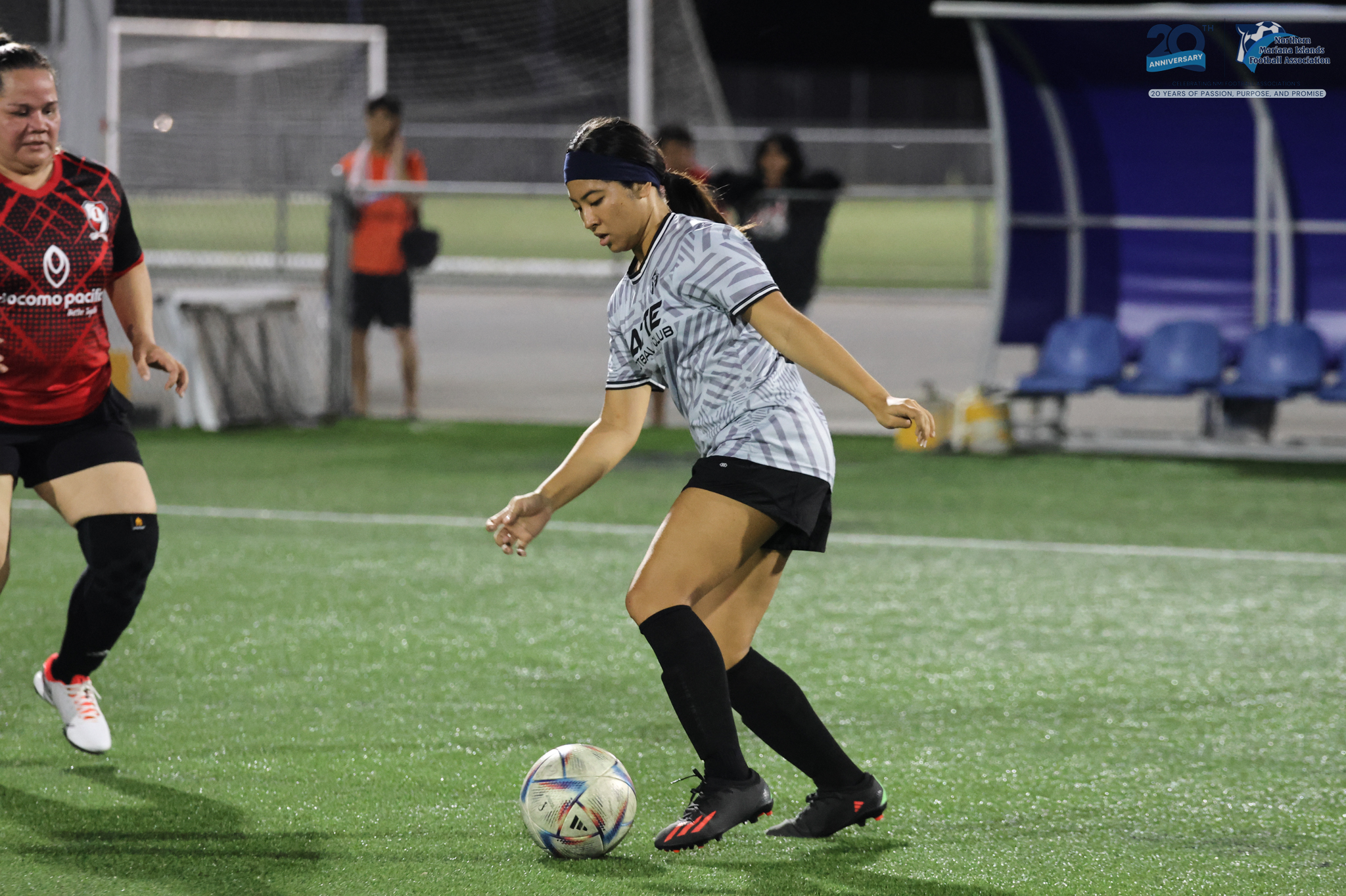 May be an image of 3 people, people playing soccer, people playing football and text