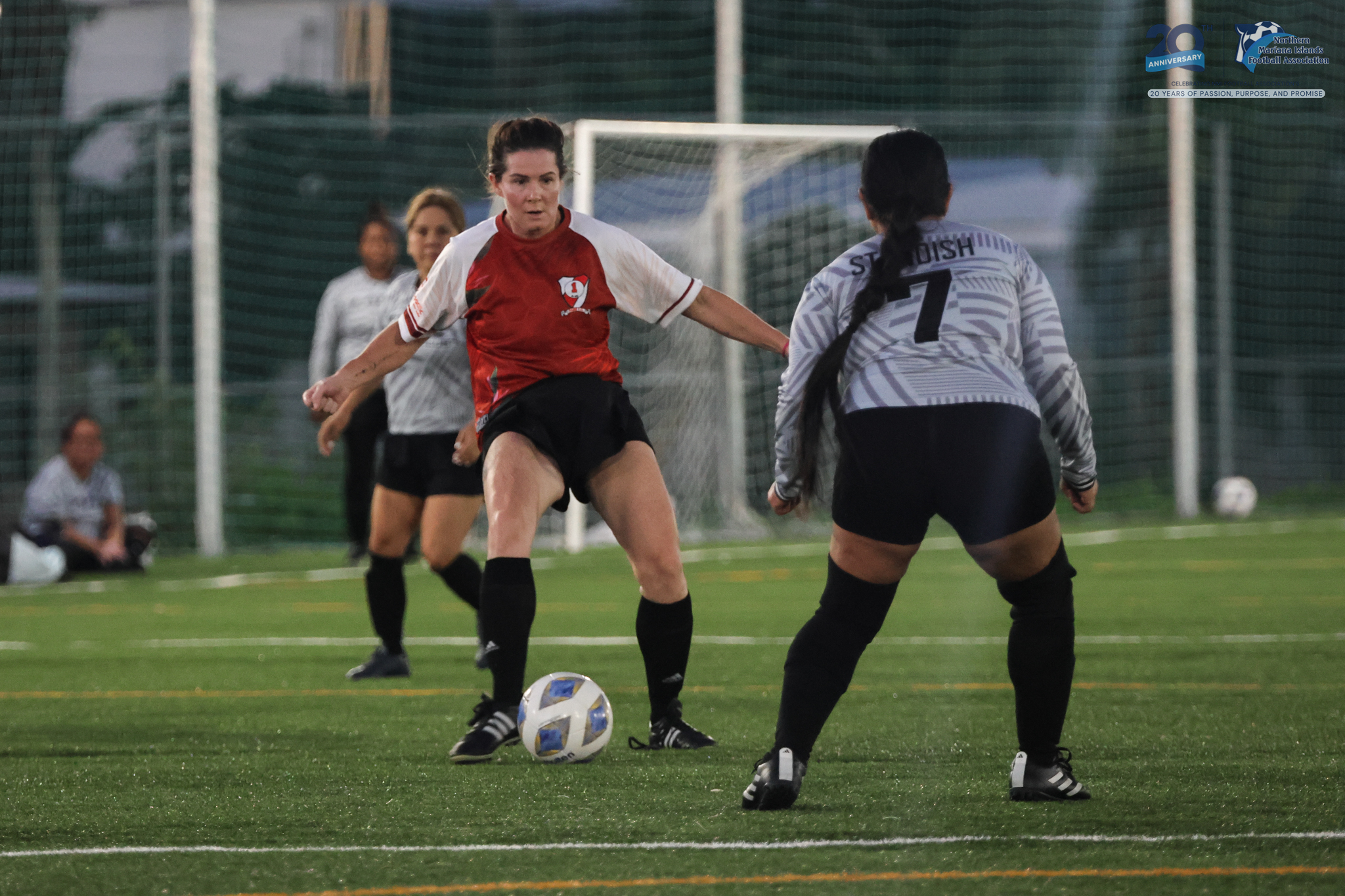 May be an image of 4 people, people playing soccer, people playing football and text
