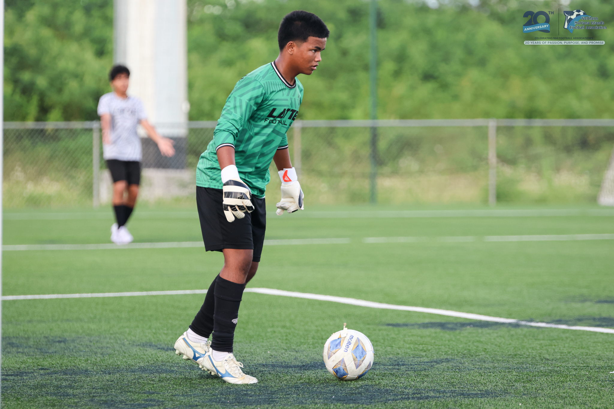 May be an image of 2 people, people playing soccer, people playing football and text