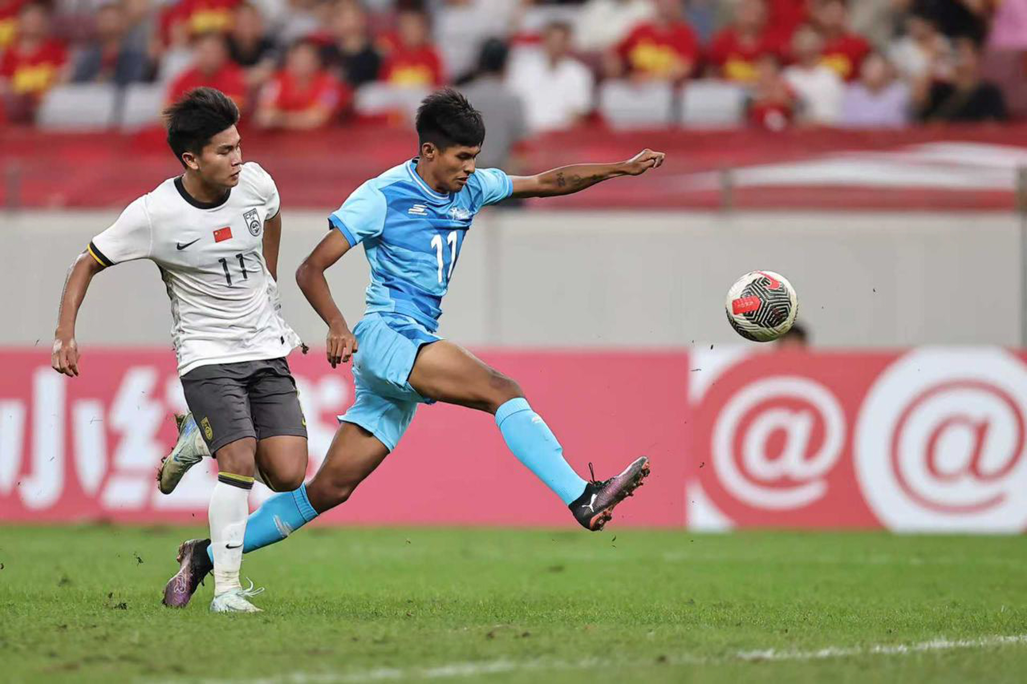 May be an image of 2 people, people playing soccer, people playing football and text