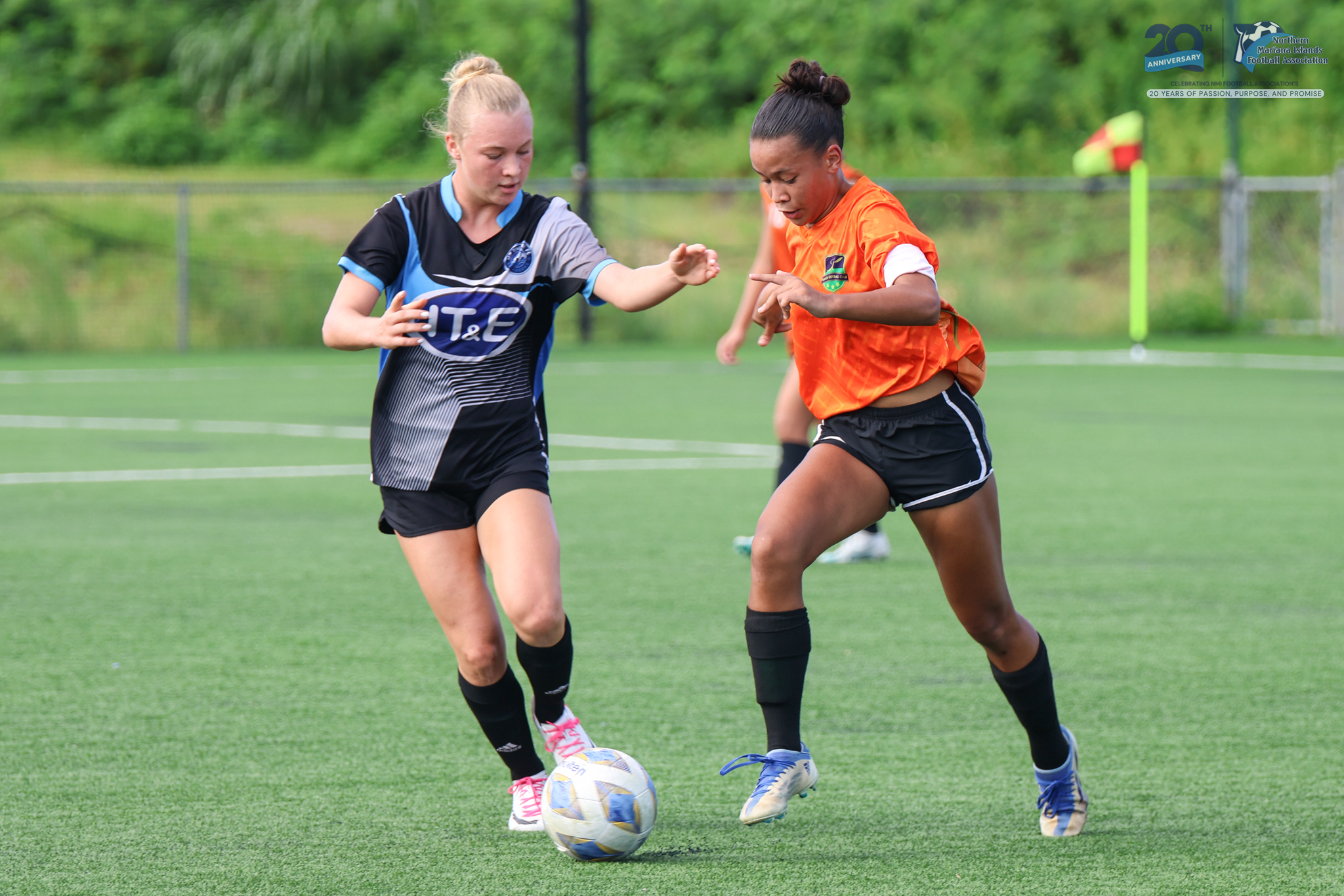 May be an image of 2 people, people playing football, people playing soccer and text