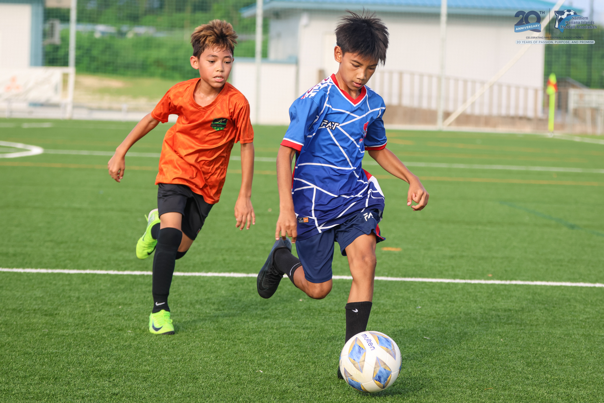 May be an image of 2 people, people playing soccer, people playing football and text