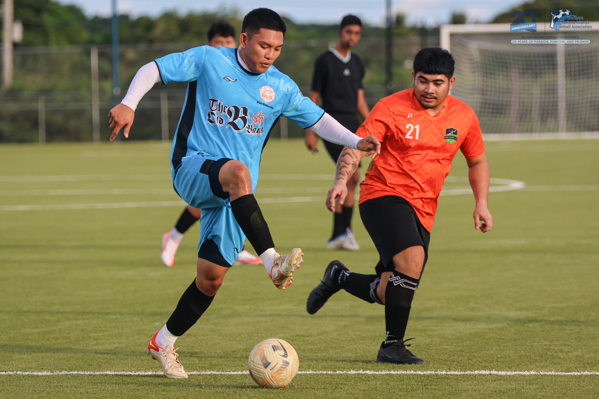 May be an image of 2 people, people playing soccer, people playing football and text