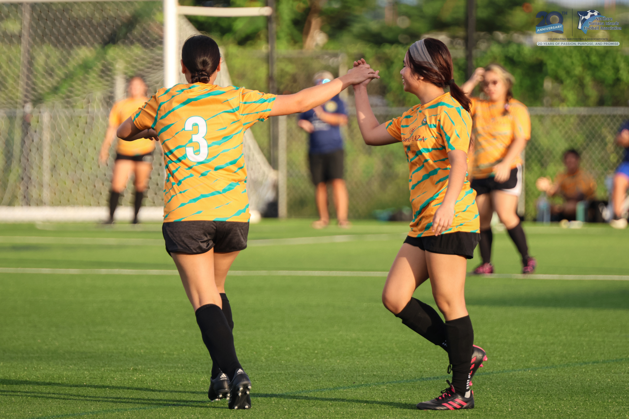May be an image of 6 people, people playing football, people playing soccer and text
