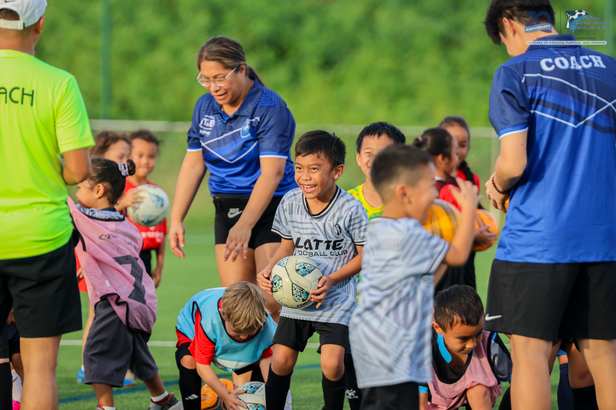 May be an image of 8 people, people playing football, people playing soccer and text