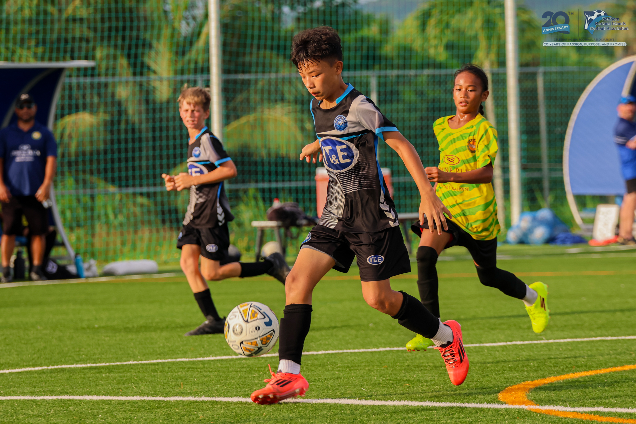 May be an image of 5 people, people playing soccer, people playing football and text