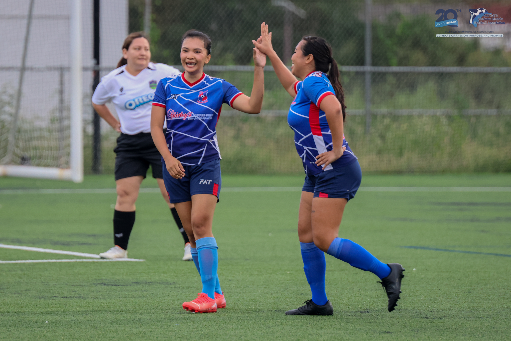 May be an image of 3 people, people playing football, people playing soccer and text