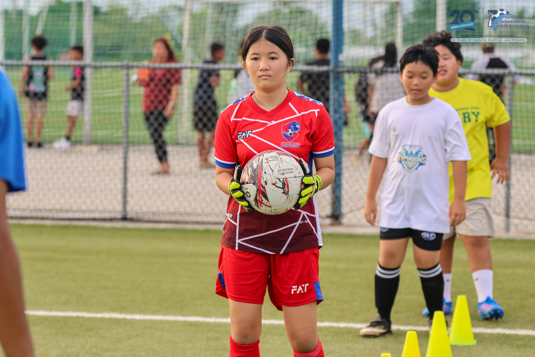 May be an image of 8 people, people playing football, people playing soccer and text