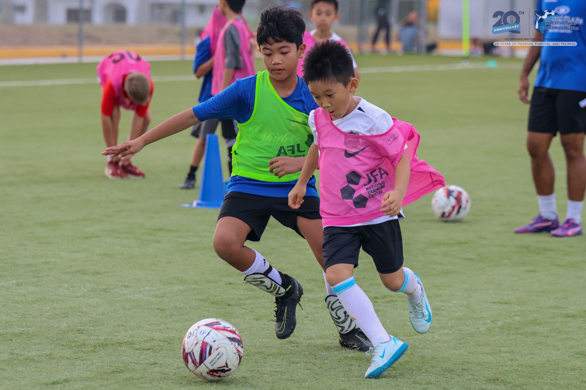 May be an image of 4 people, people playing soccer, people playing football and text