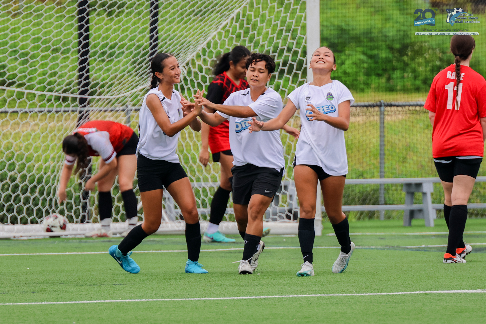 May be an image of 6 people, people playing football, people playing soccer and text