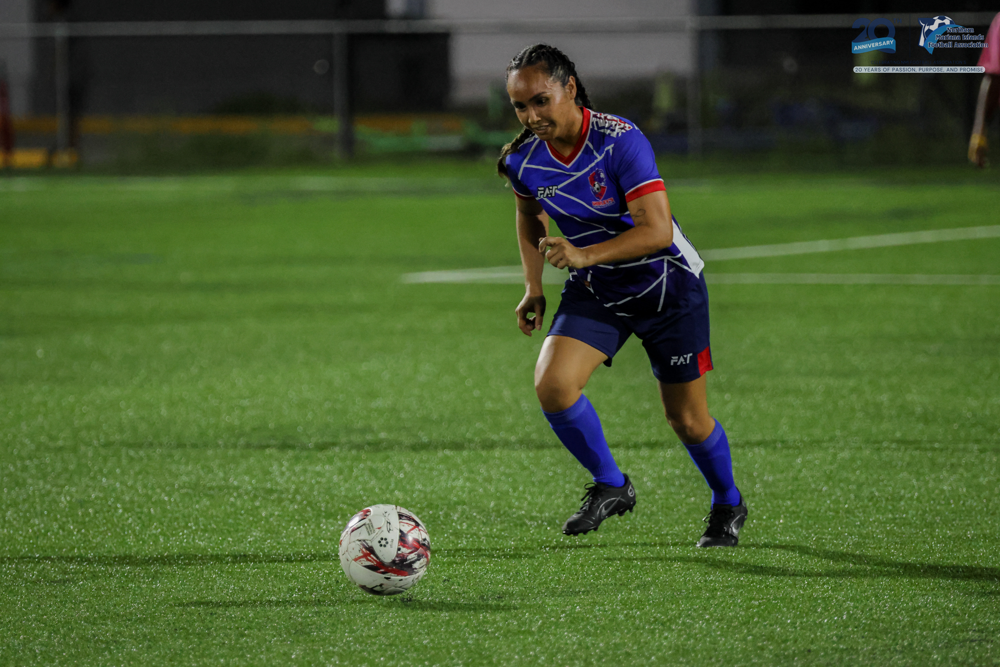 May be an image of 1 person, playing football, playing soccer and text