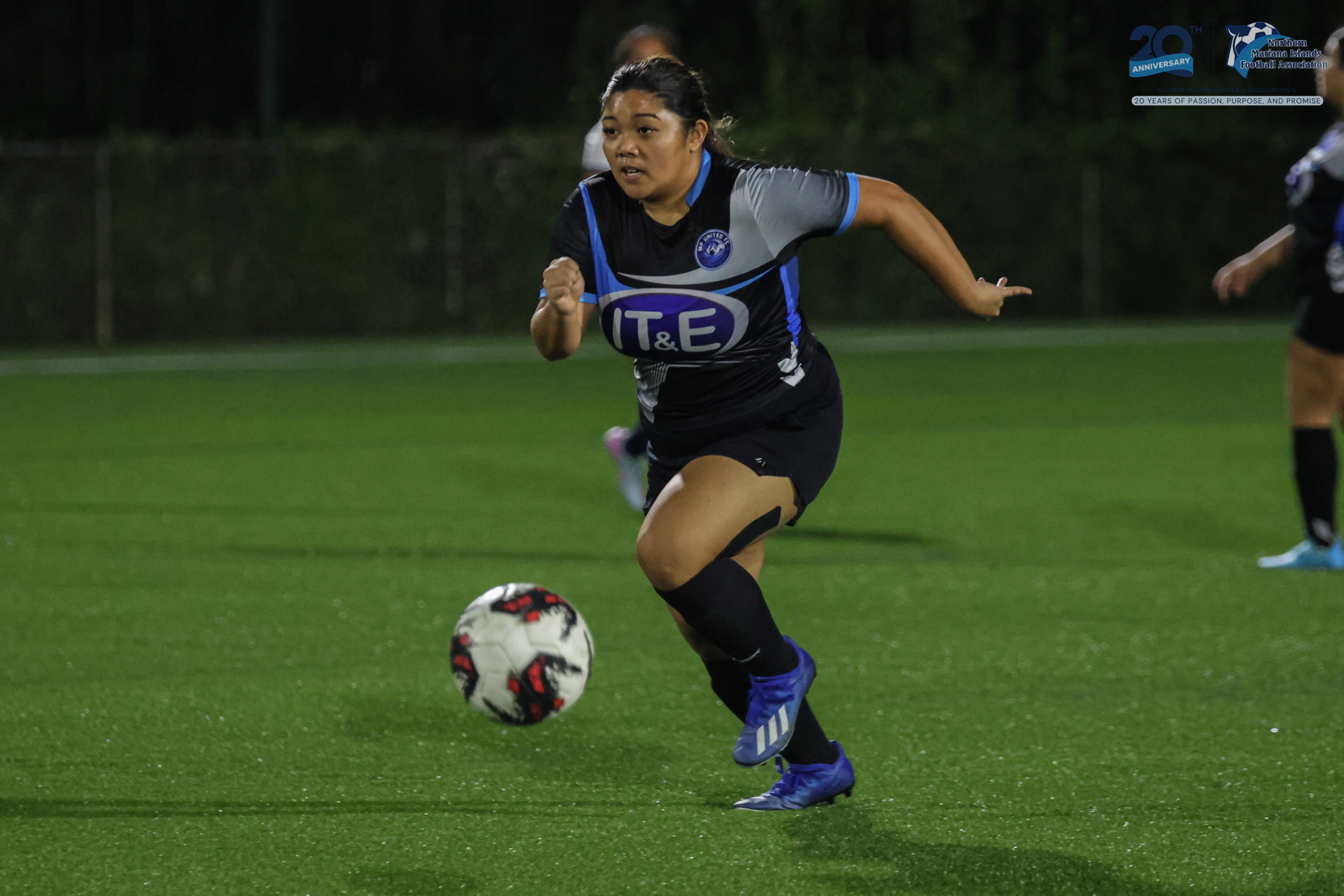 May be an image of 2 people, people playing football, people playing soccer and text