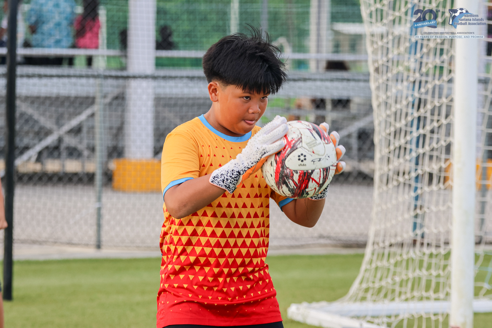 May be an image of 1 person, playing football, playing soccer and text