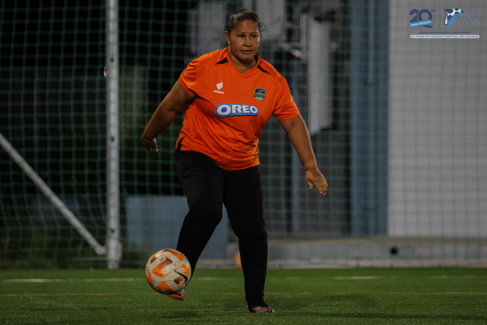 May be an image of 1 person, playing football, playing soccer and text