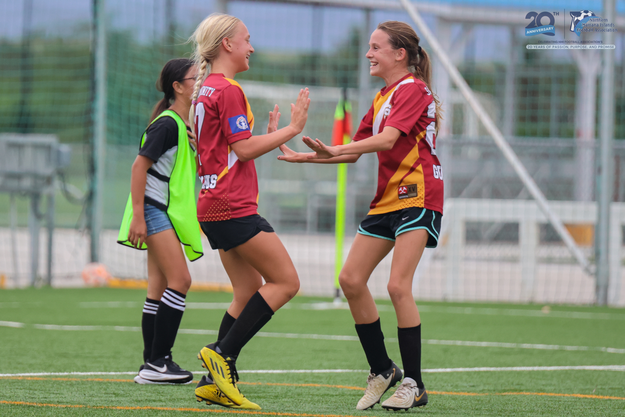 May be an image of 3 people, people playing soccer, people playing football and text