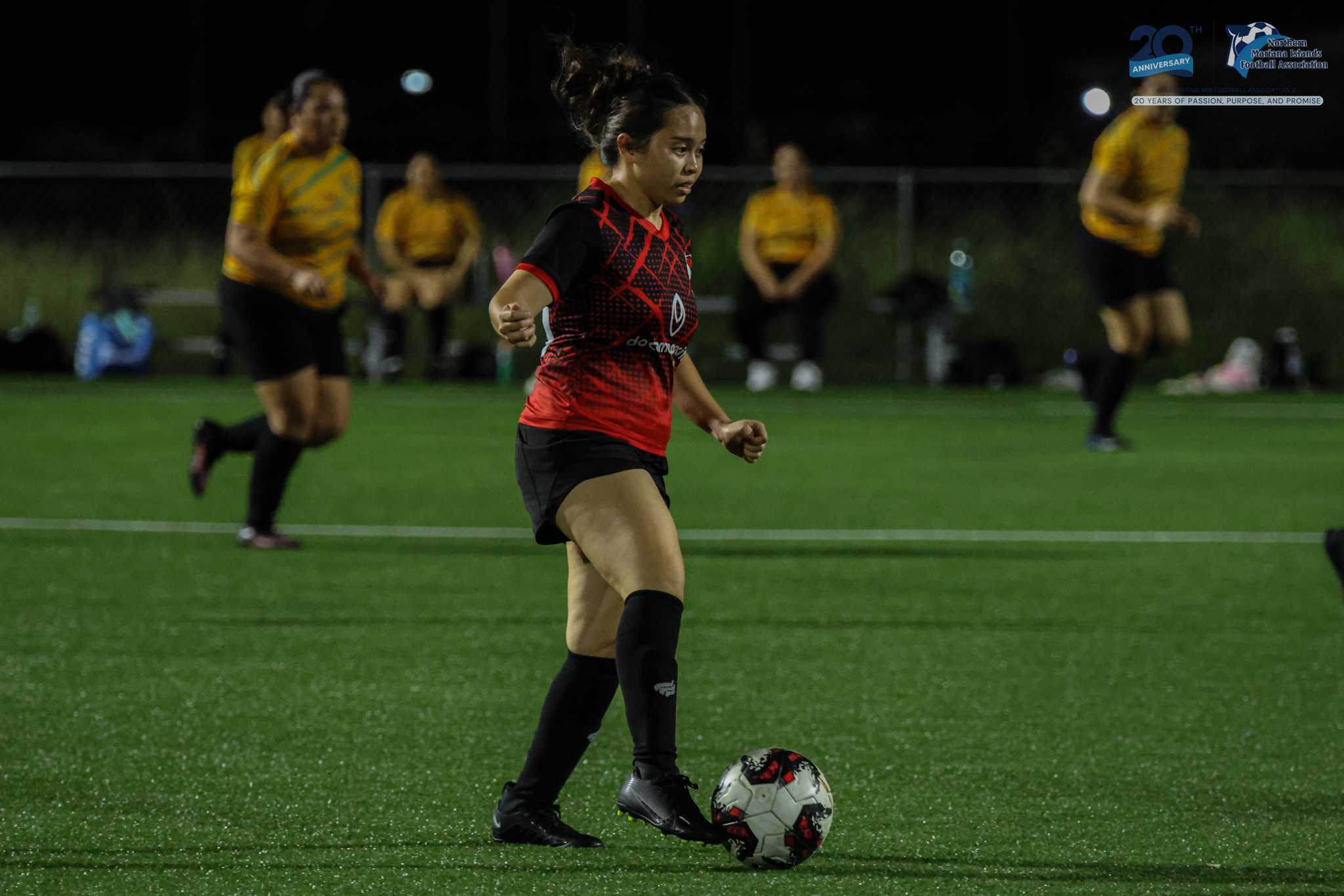 May be an image of 5 people, people playing football, people playing soccer and text