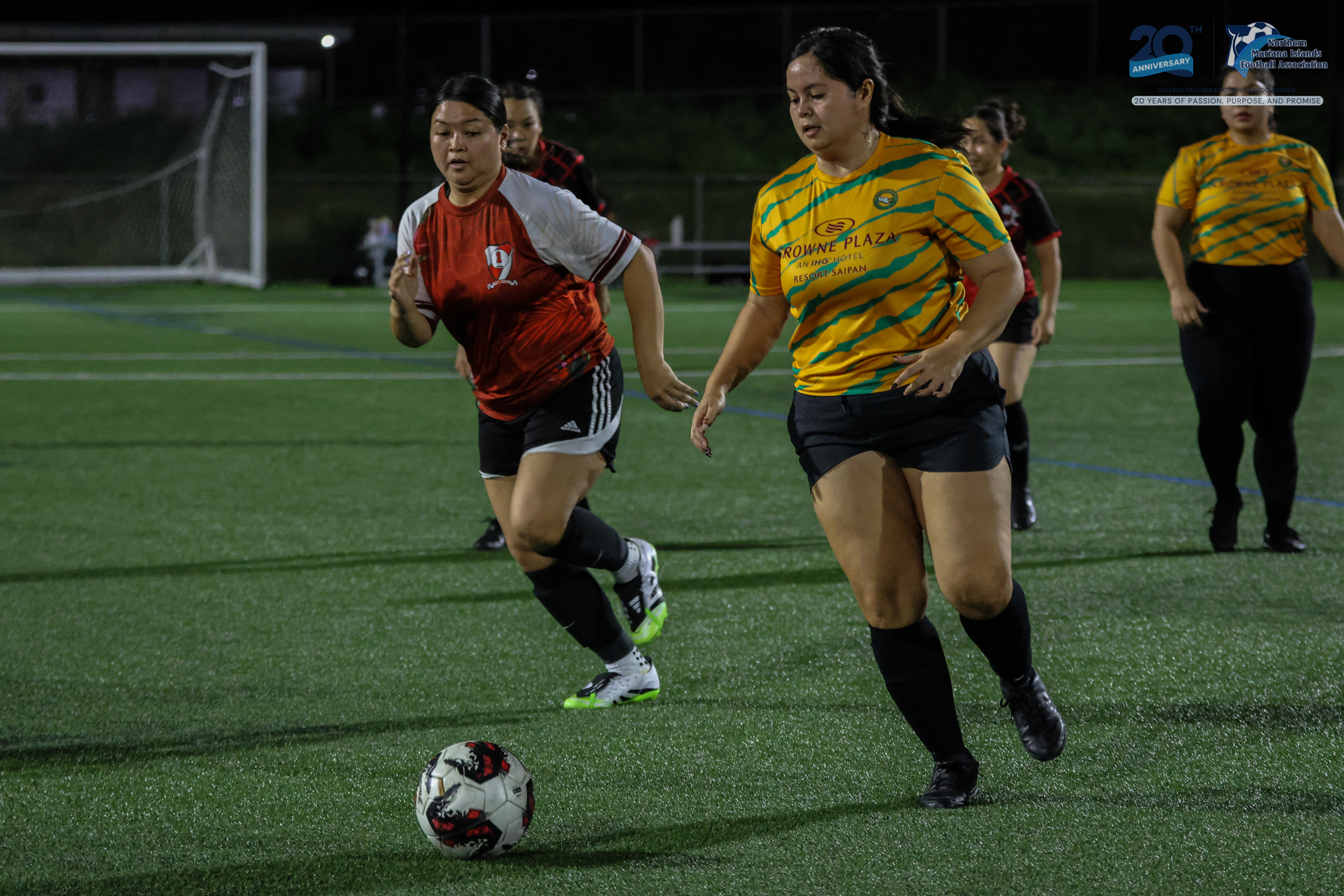 May be an image of 4 people, people playing football, people playing soccer and text