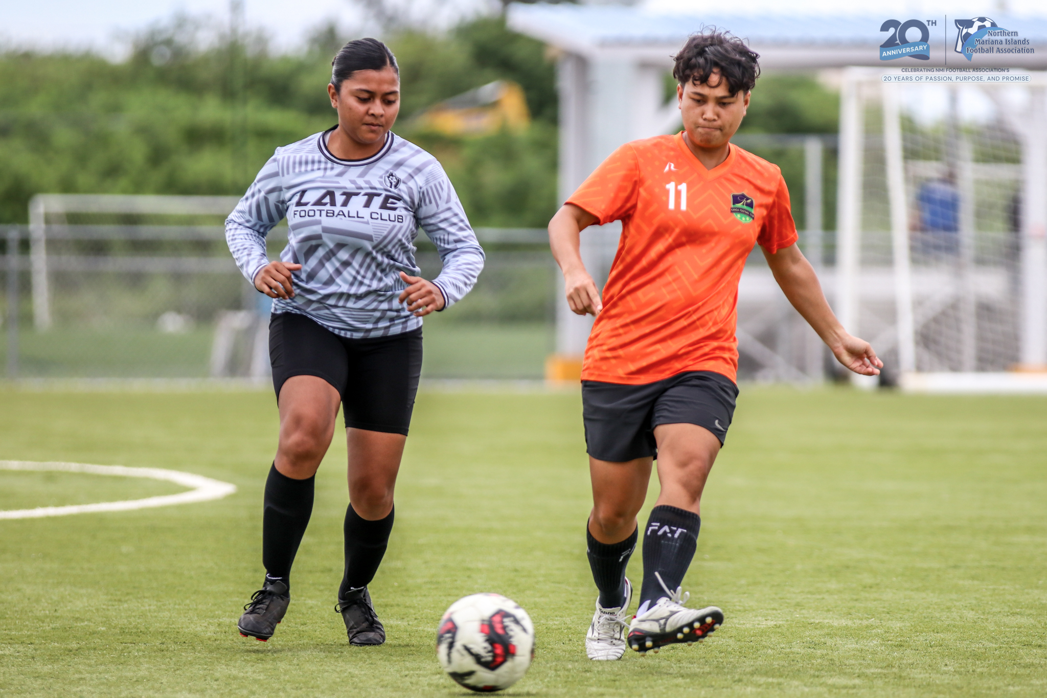 May be an image of 2 people, people playing soccer, people playing football and text