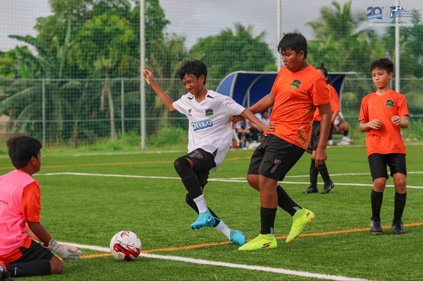 May be an image of 5 people, people playing soccer, people playing football and text