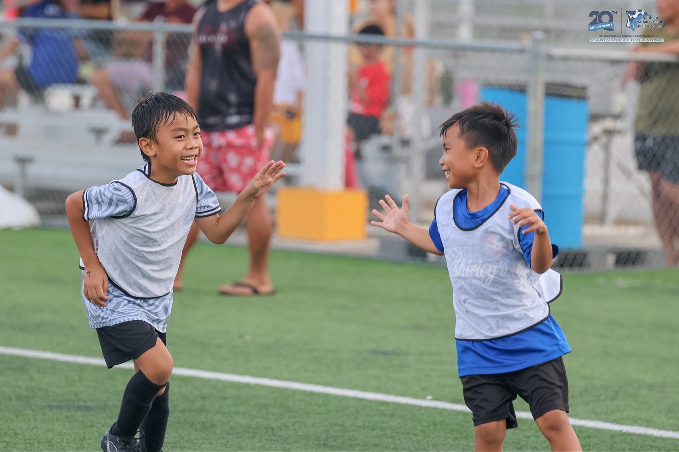 May be an image of 5 people, people playing soccer and people playing football