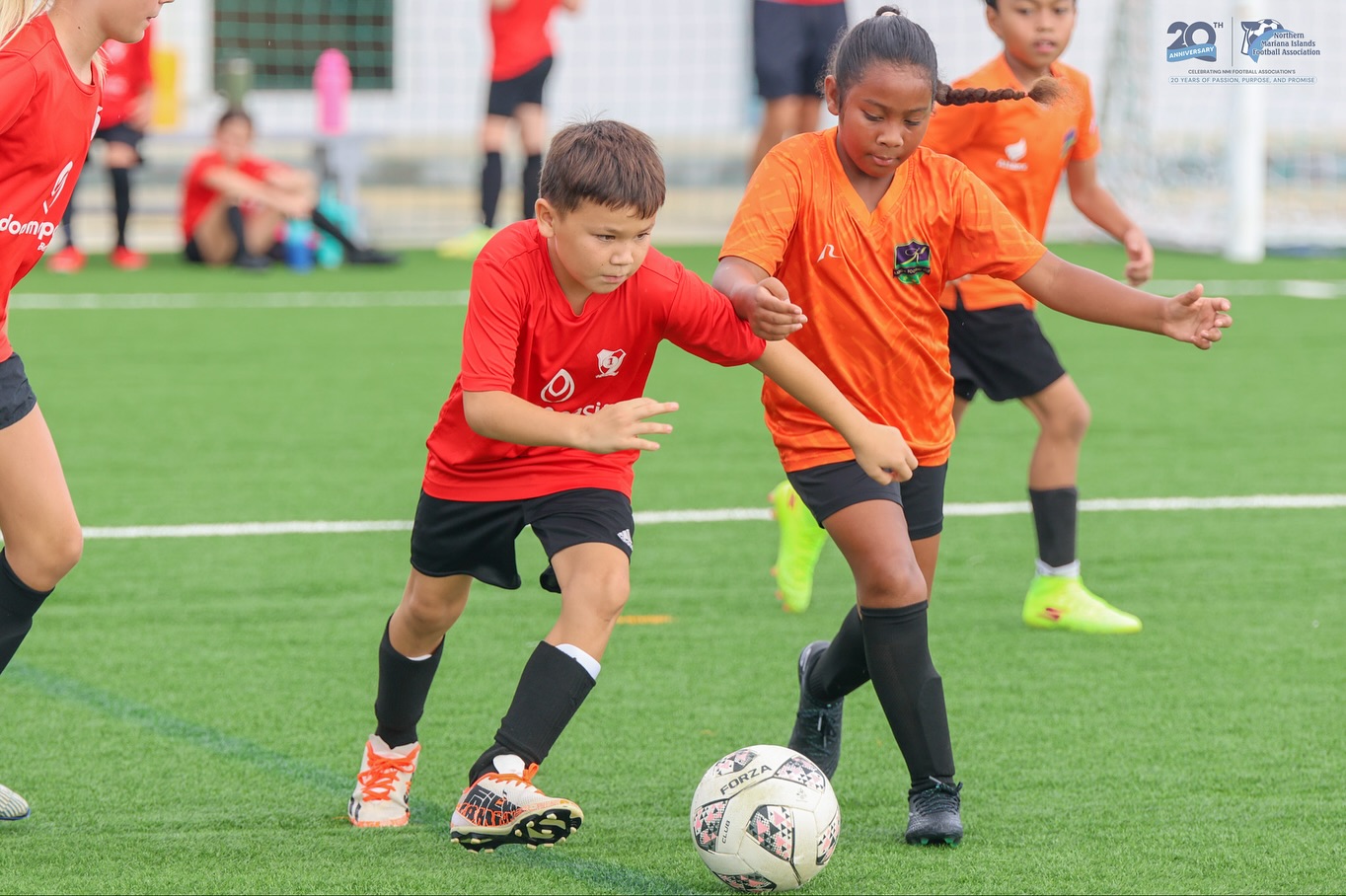 May be an image of 5 people, people playing soccer, people playing football and text