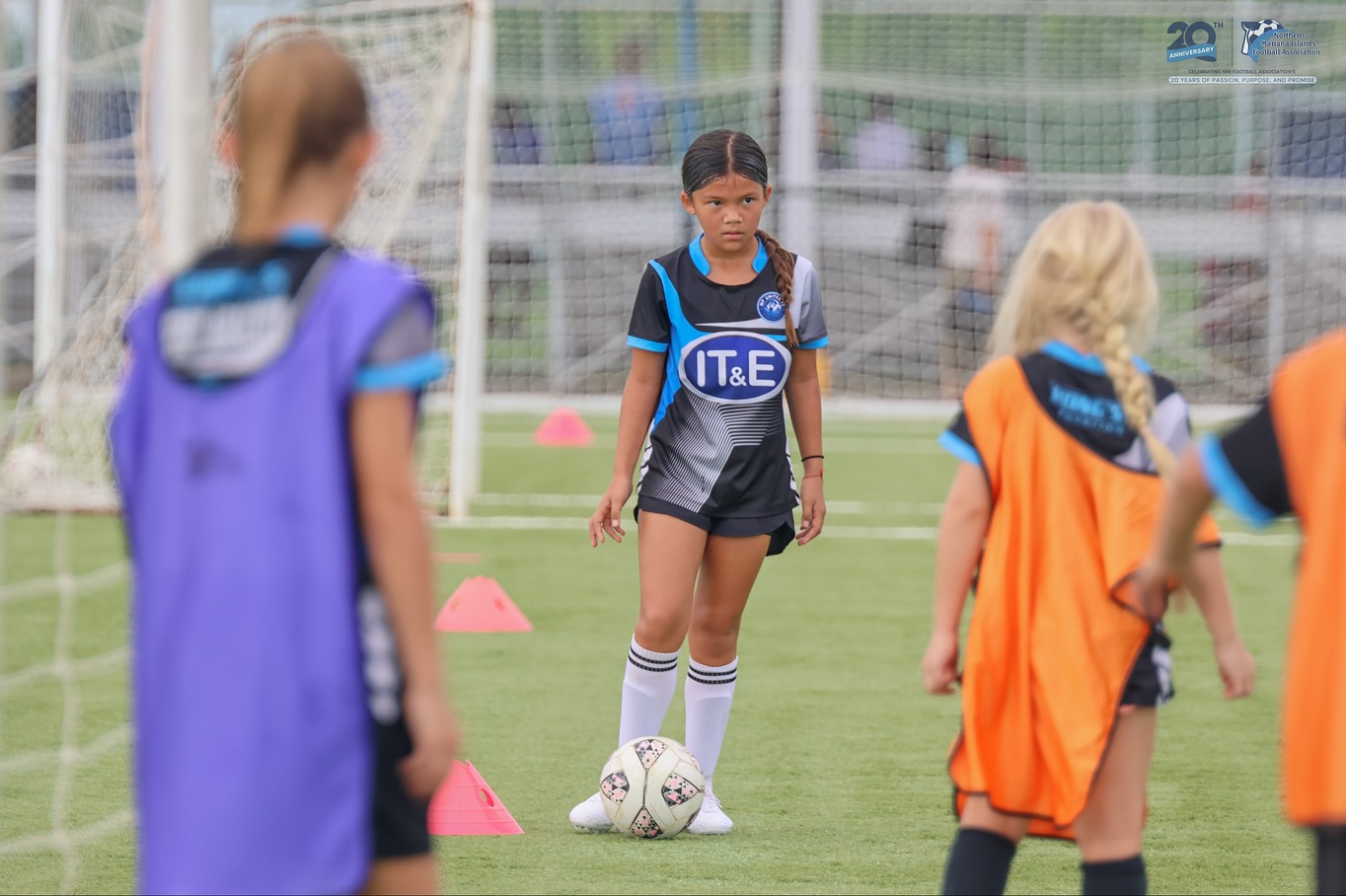 May be an image of 4 people, people playing football, people playing soccer and text