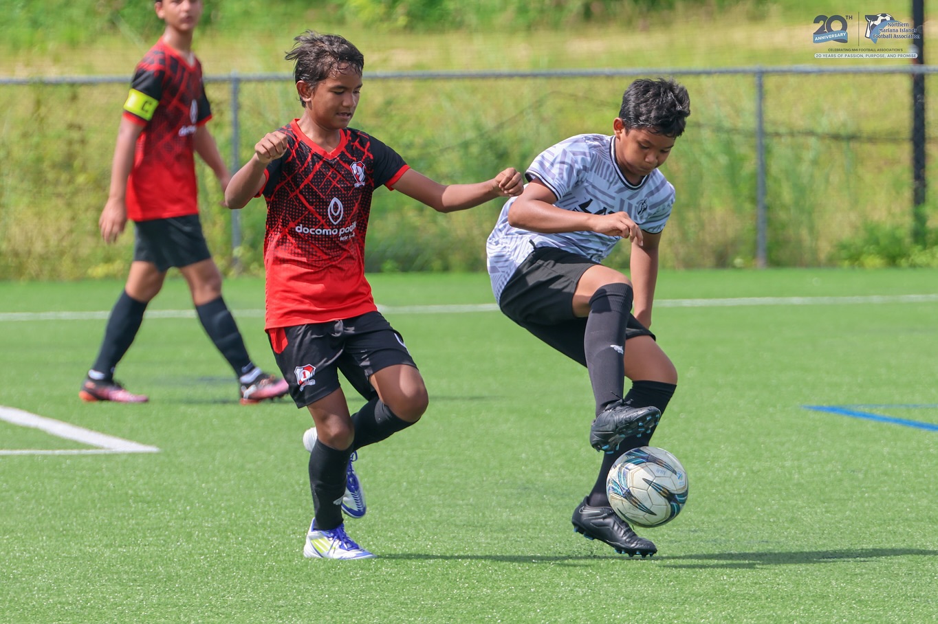May be an image of 3 people, people playing soccer, people playing football and text