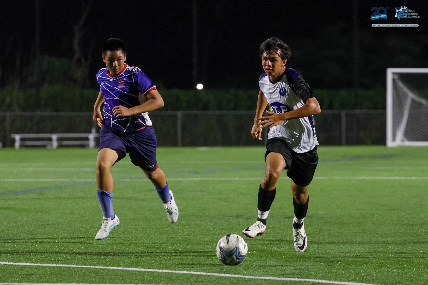 May be an image of 2 people, people playing soccer, people playing football and text