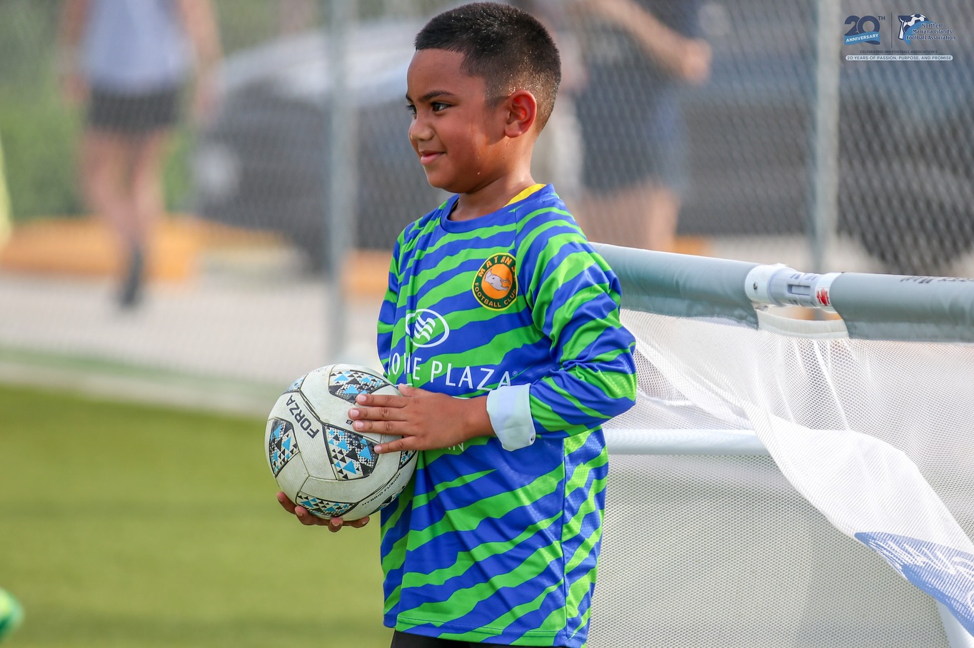 May be an image of 2 people, people playing soccer, people playing football and text