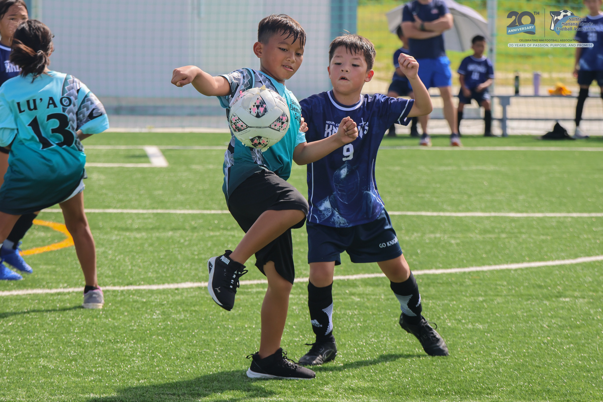 May be an image of 6 people, people playing football, people playing soccer and text