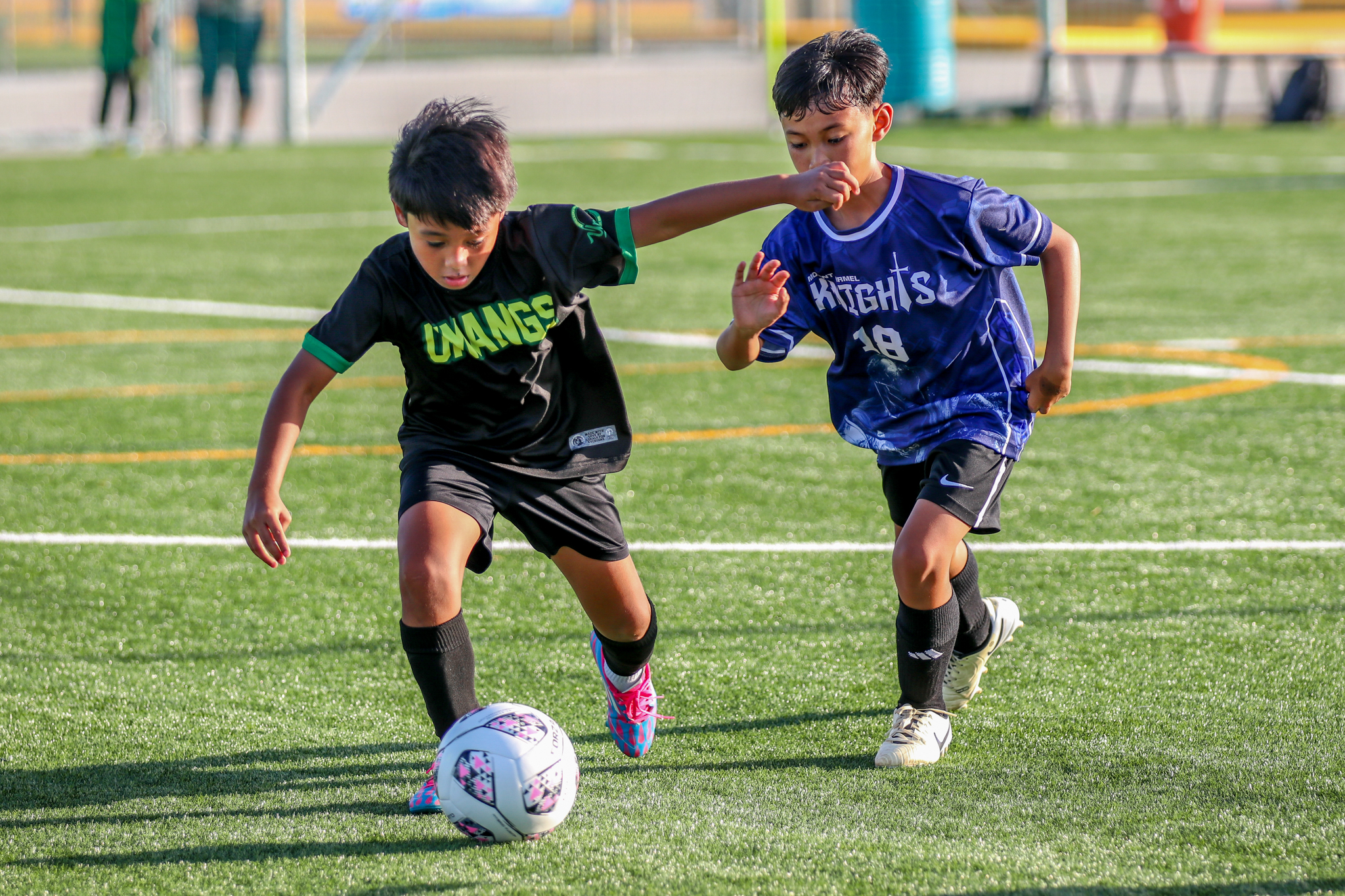 May be an image of 5 people, people playing football, people playing soccer and text