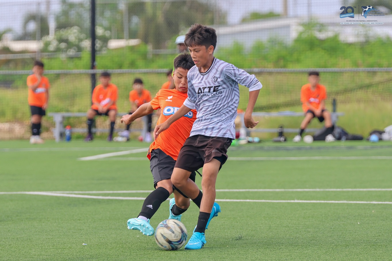 May be an image of 5 people, people playing football, people playing soccer and text