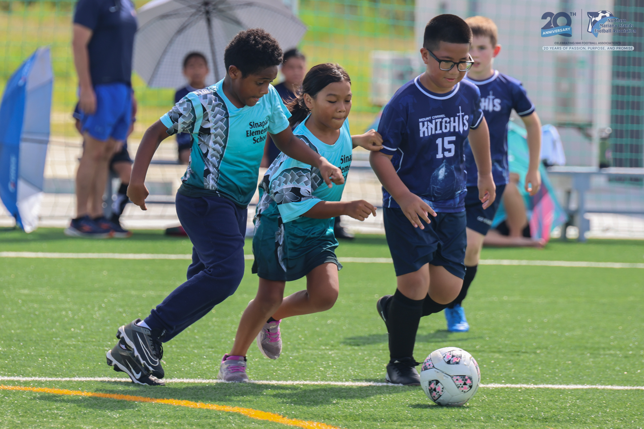May be an image of 5 people, people playing soccer, people playing football and text