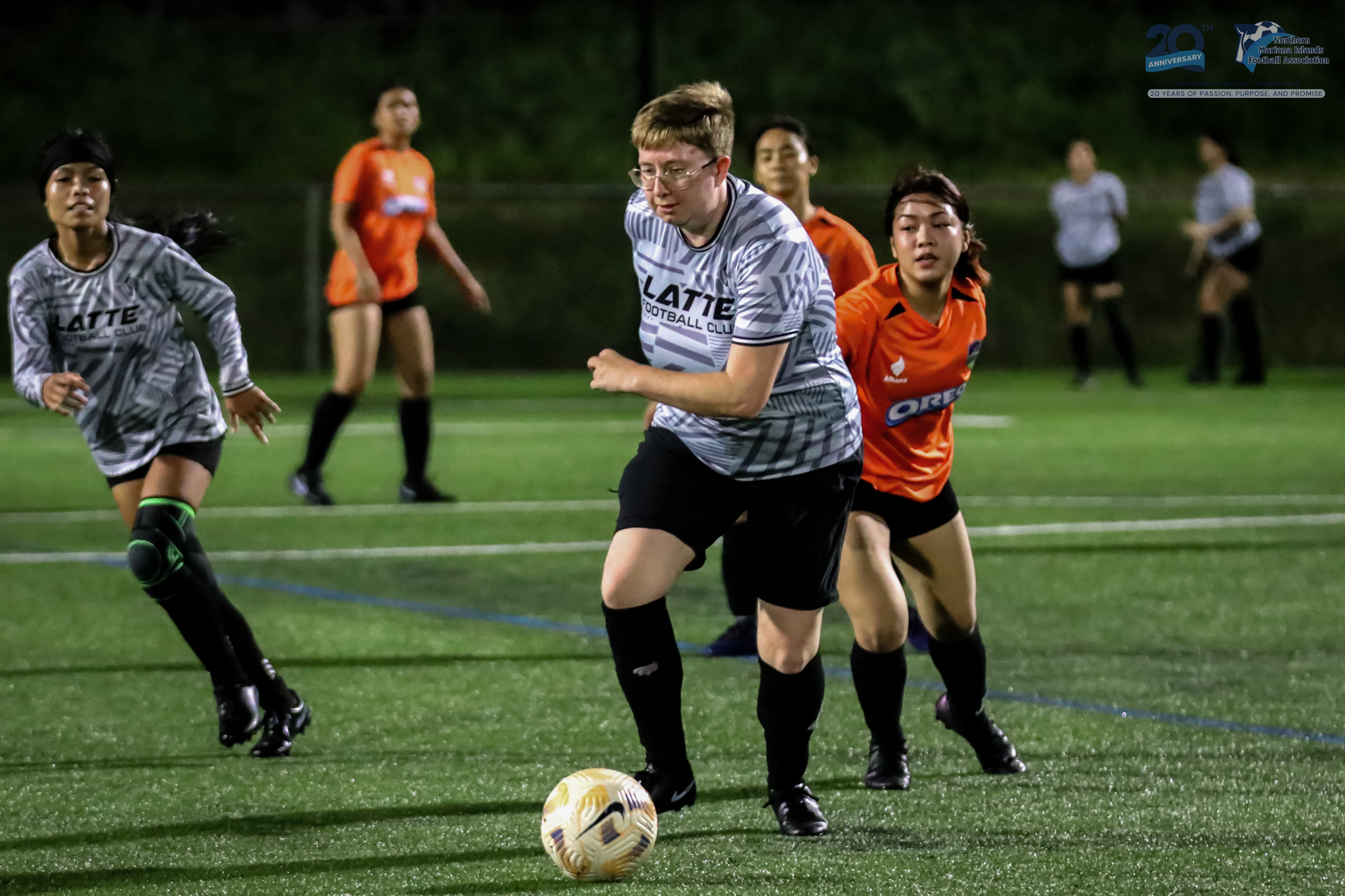 May be an image of 6 people, people playing soccer, people playing football and text