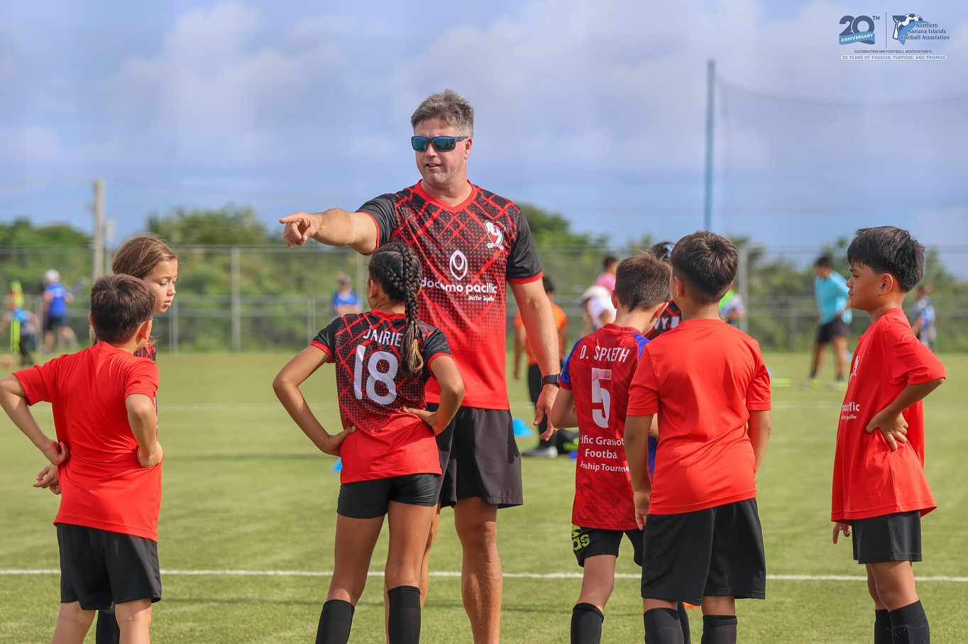 May be an image of 7 people, people playing soccer, people playing football and text