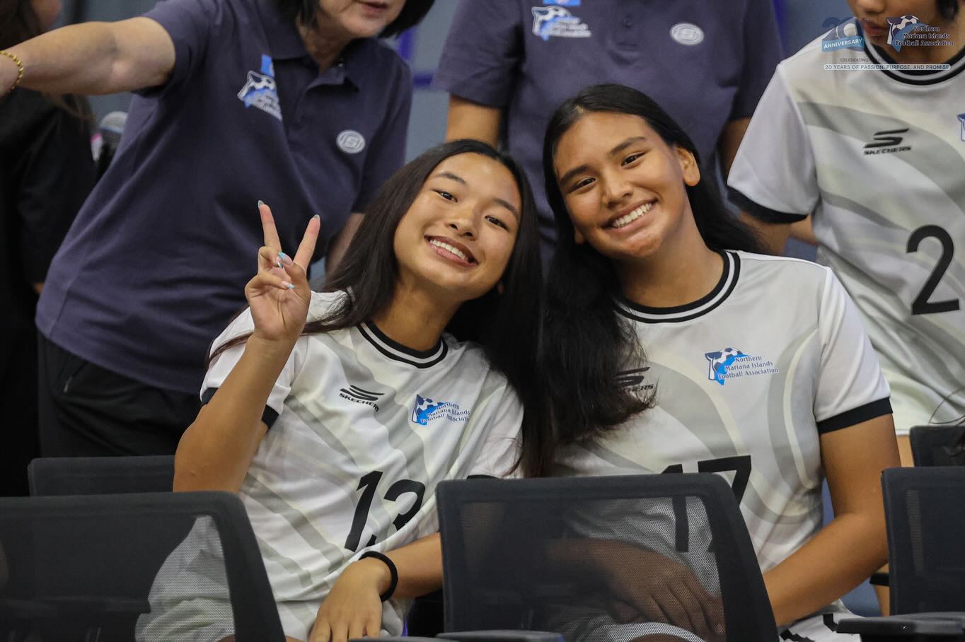 May be an image of 4 people, people playing voleyball and text