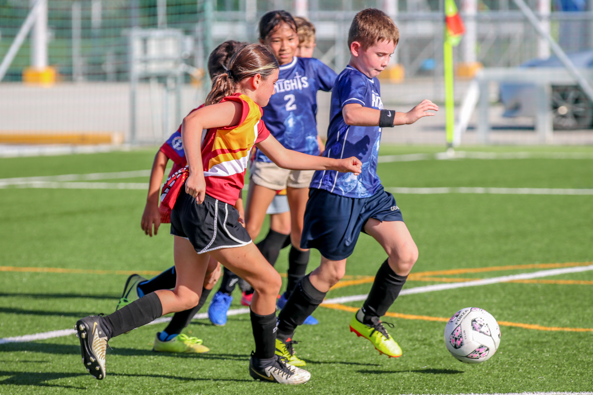 May be an image of 2 people, people playing football, people playing soccer, grass and text that says 'HIGHTS 2 KAm'